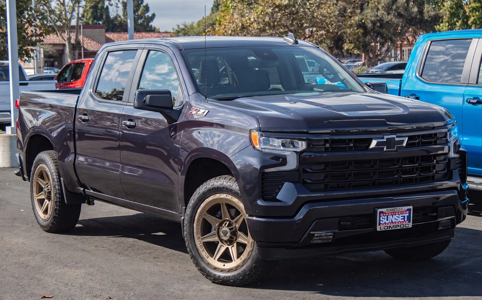 Chevrolet Silverado 1500 with Blaque Diamond O102 wheels in Bronze