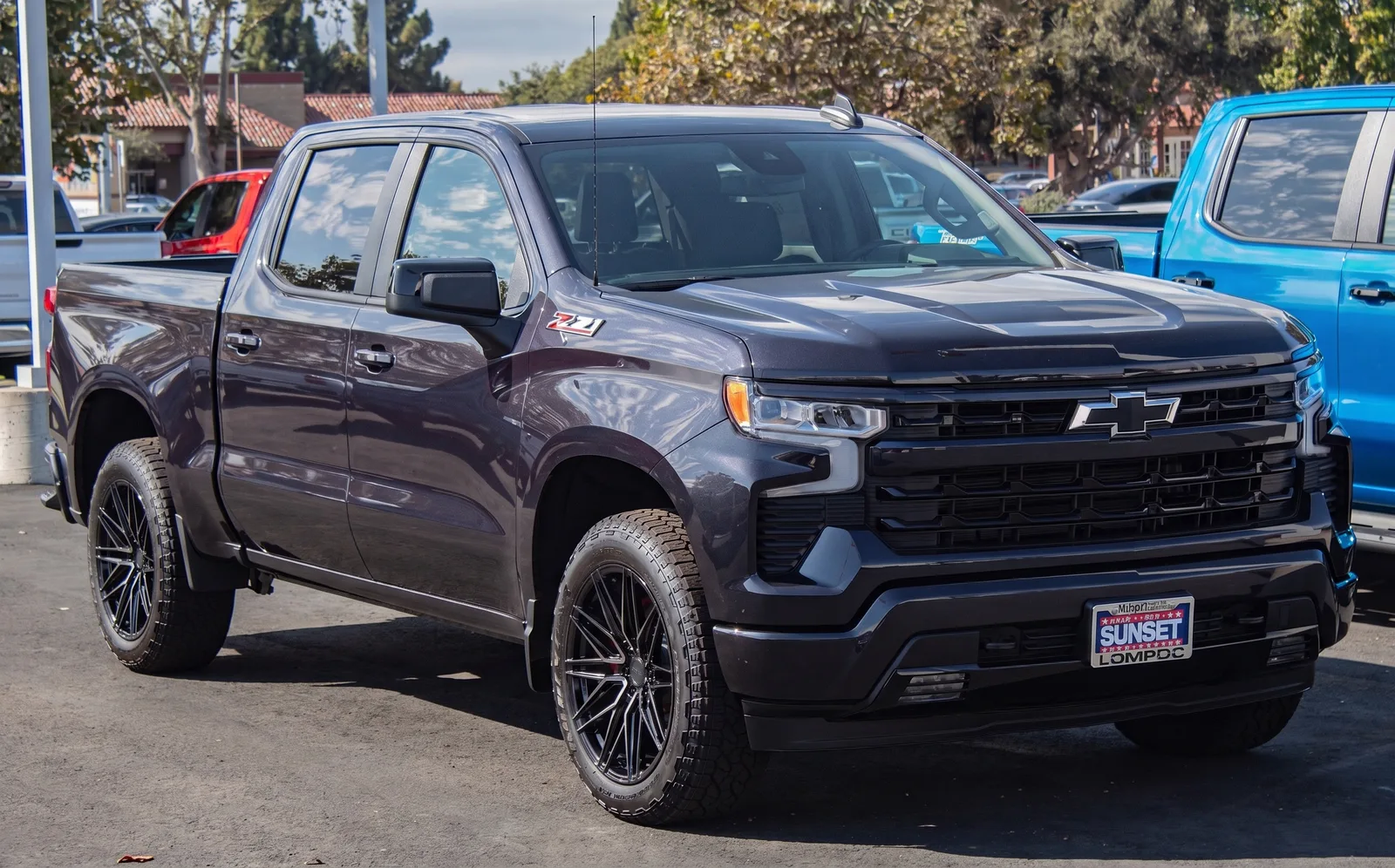 Chevrolet Silverado 1500 with Vossen HF6-5 wheels in Tinted Gloss Black