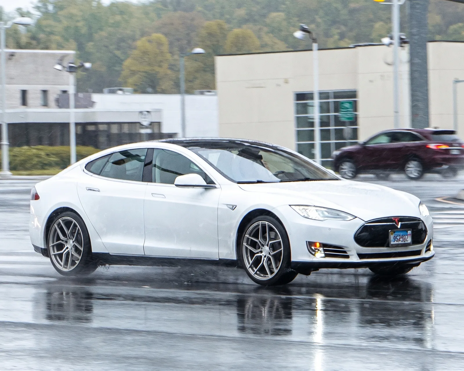 Tesla Model S with Rohana RFX11 wheels in Brushed Titanium