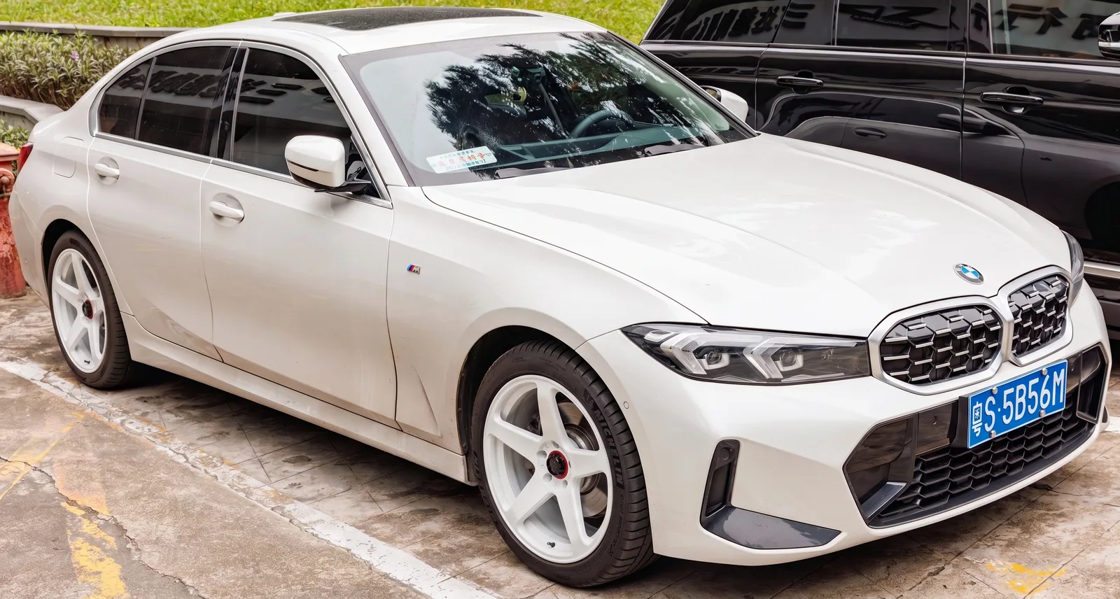 BMW 3 Series on aftermarket wheels