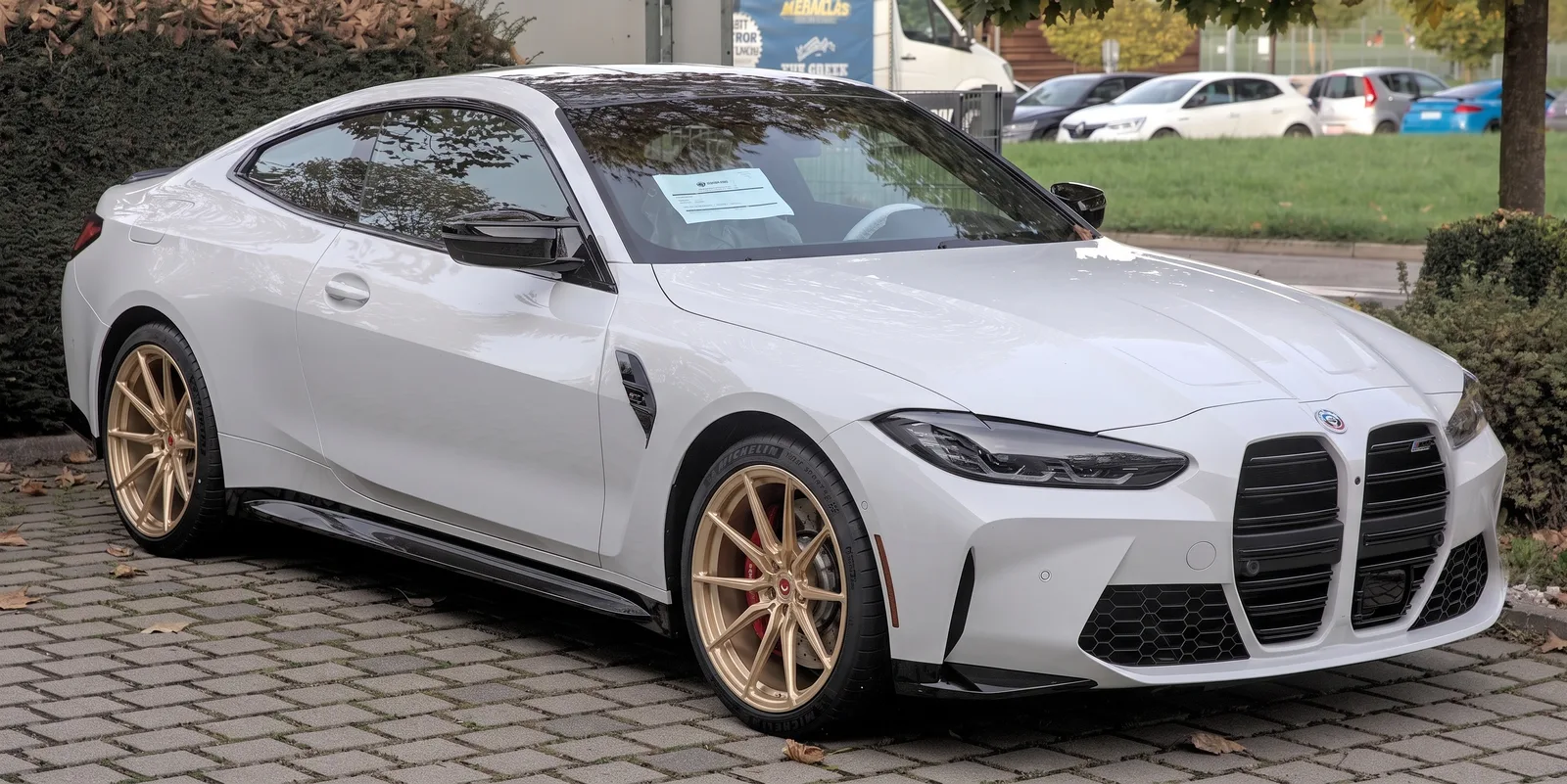 BMW M4 with Vossen M-X2 wheels in Patina Gold