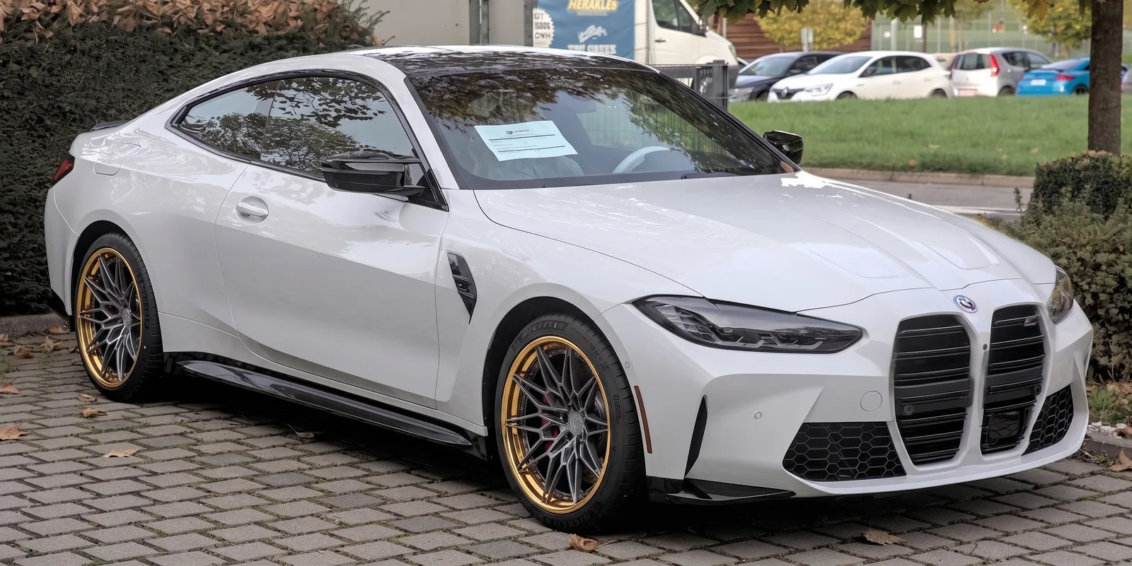 BMW M4 with AG Luxury AGL35 wheels in Black And Copper