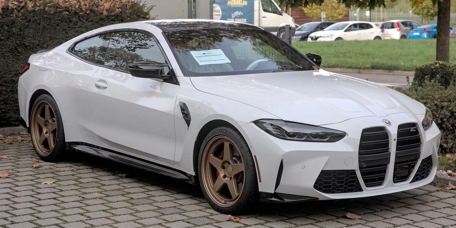 BMW M4 with Kansei KNP wheels in Bronze