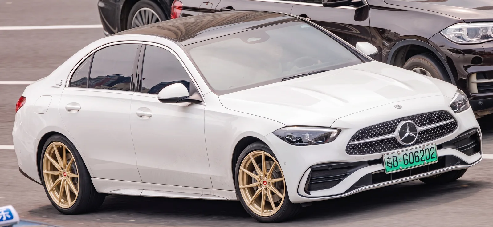 Mercedes-Benz C-Class with Vossen M-X2 wheels in Patina Gold